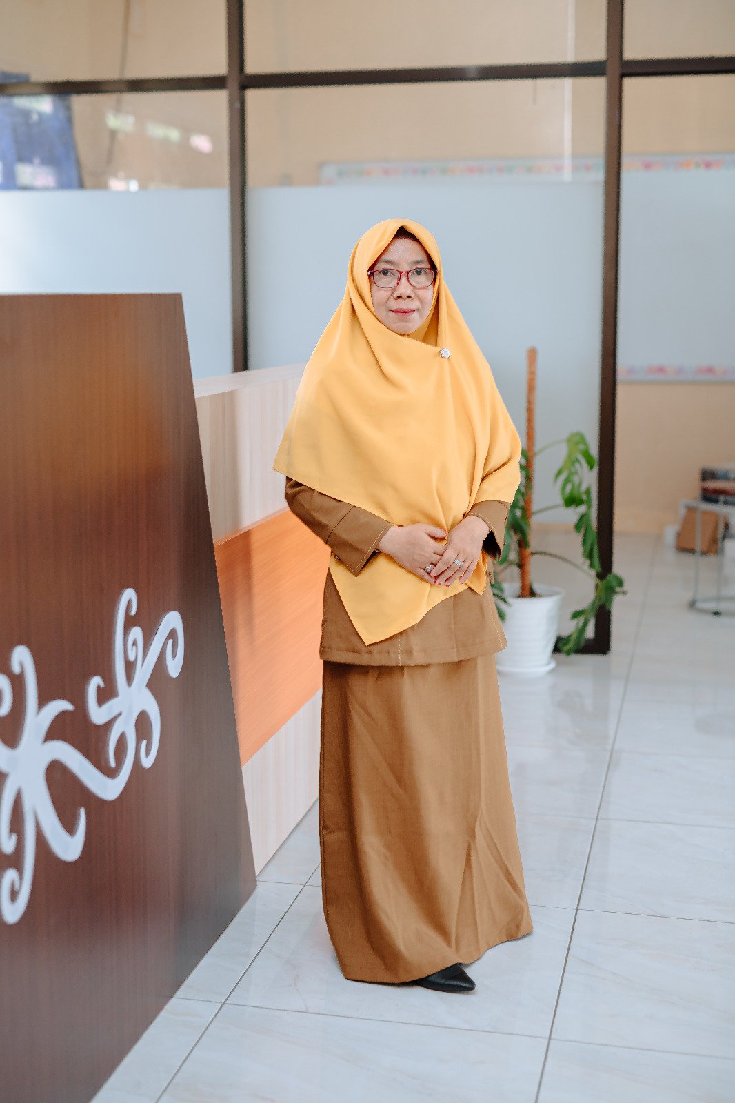 DAHLIANI,S.Hut.,S.Pd